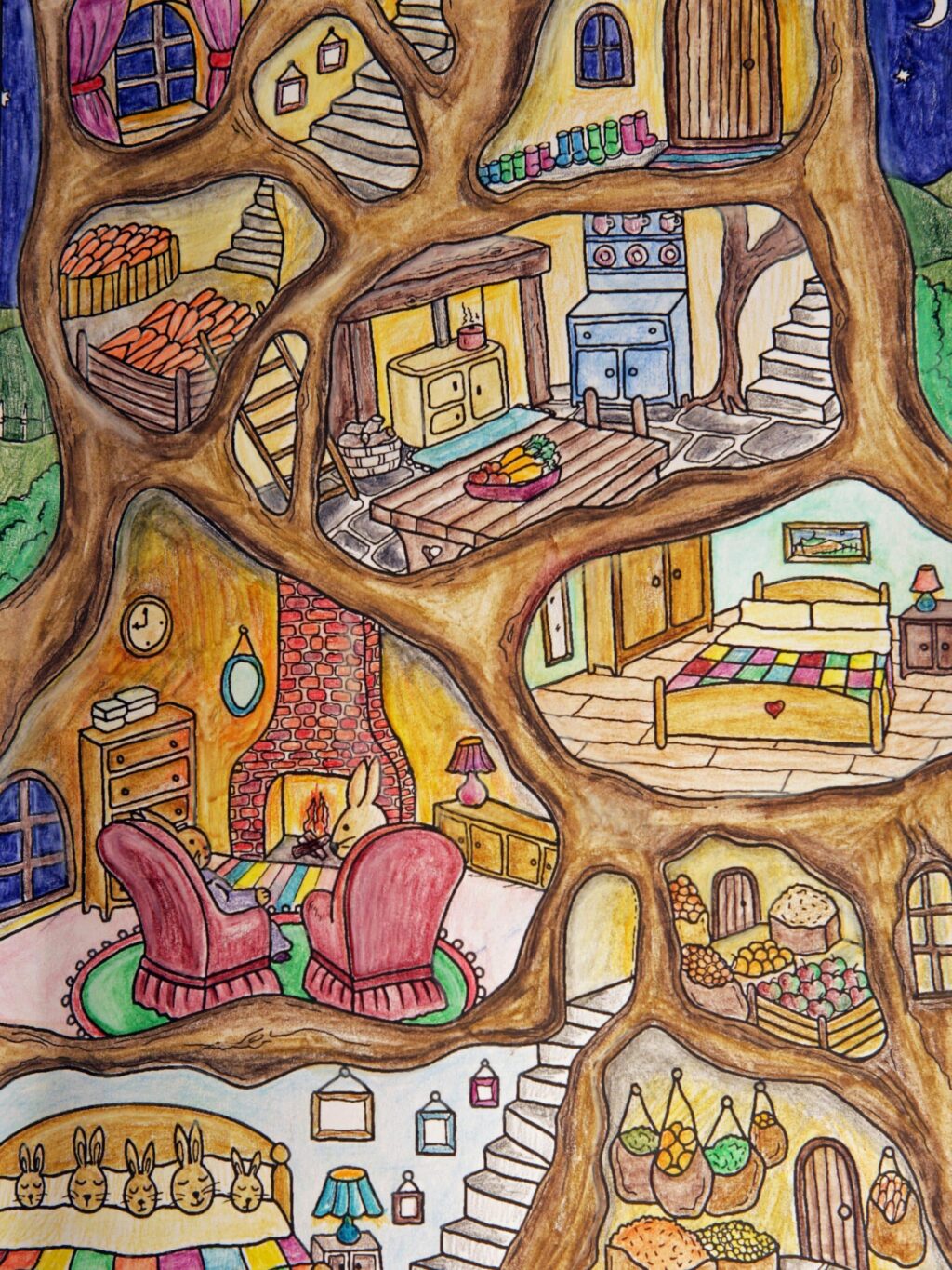 Colourful cutaway illustration of a tree house with a kitchen, bedrooms, fireplace and winding staircases.